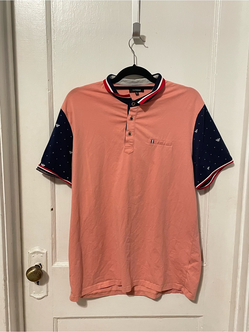 Men's Coral Polo with Navy Contrast Sleeves
